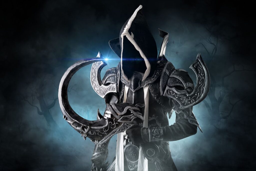 Dark fantasy armored warrior with hood and crescent blade standing in a mystical foggy forest.