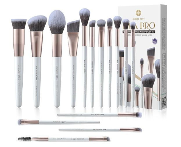 White and rose gold professional makeup brush set with various face and eye brushes, displayed alongside branded packaging.