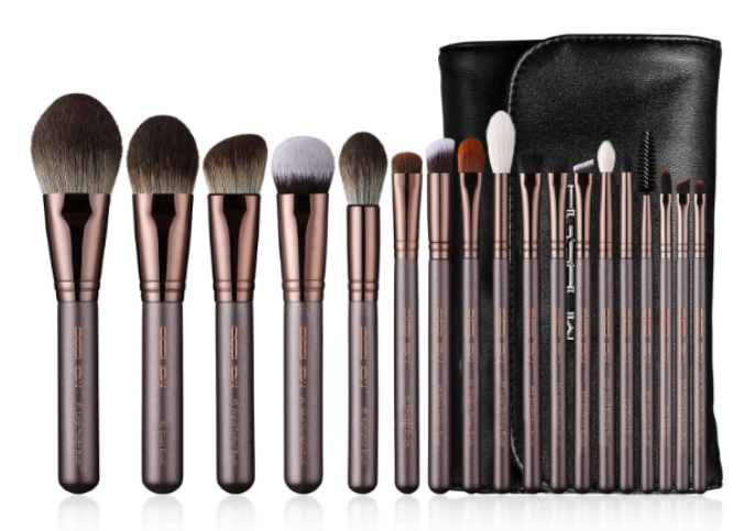 EIGSHOW Full professional makeup brush set with rose gold ferrules and dark handles, arranged in a row with a black carrying case.