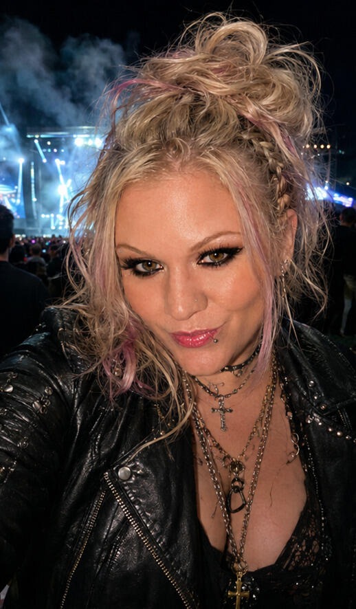 Woman at a concert with cute festival hair up-do.
