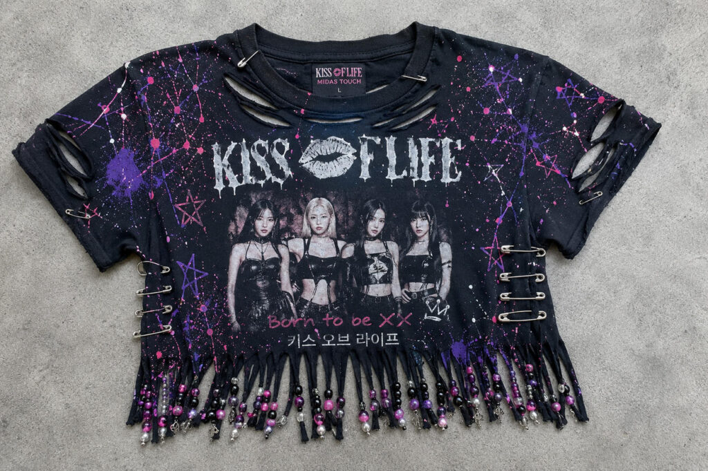 Reconstructed band tee made into a cropped fringe with safety pins version for concerts.
