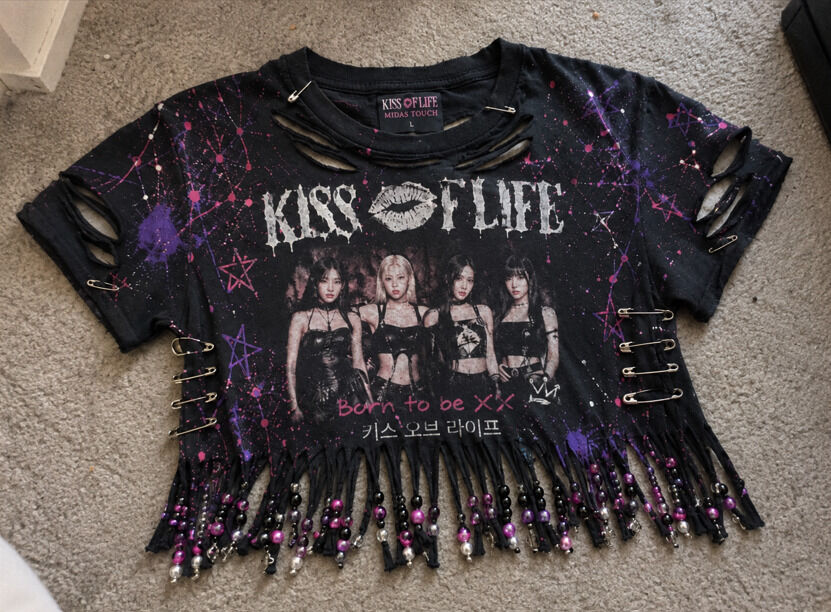 Reconstructed band tee made into a cropped fringe with safety pins version for concerts.