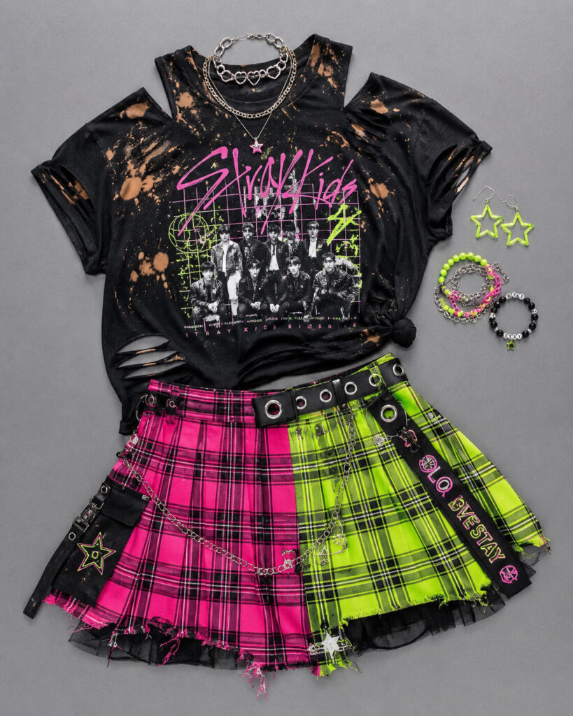 A cute punk grunge DIY outfit with a band tee and plaid skirt deconstructed look to wear to concerts.